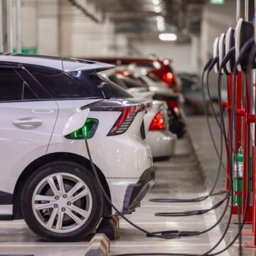 Electric Vehicles At EV Charging Station