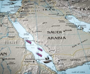 A Map Of The Red Sea Region With Models Of Cargo And Pirate Ships