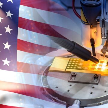 Concept Image Of Microprocessor Manufacturing And Production Against U.S. Flag