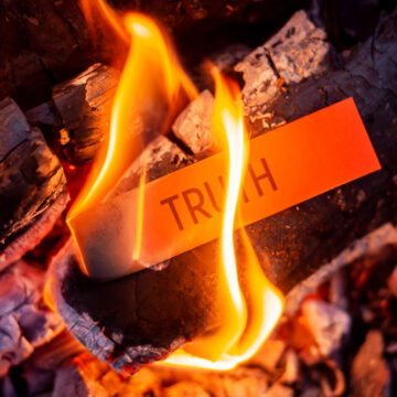 Red Paper With Inscription Truth Burning In The Fire