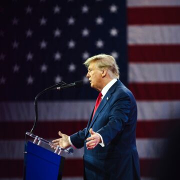 Donald Trump Speaks At A Podium