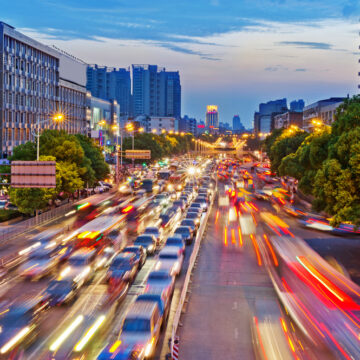 Aerial View Of City At Night With Heavy Traffic