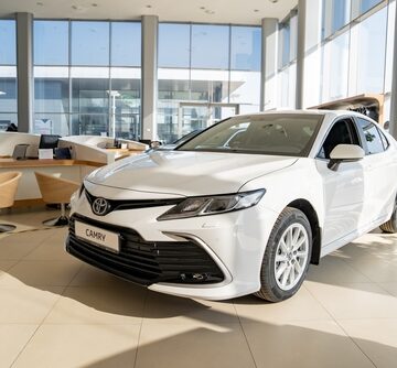 New White Toyota Camry In A Showroom