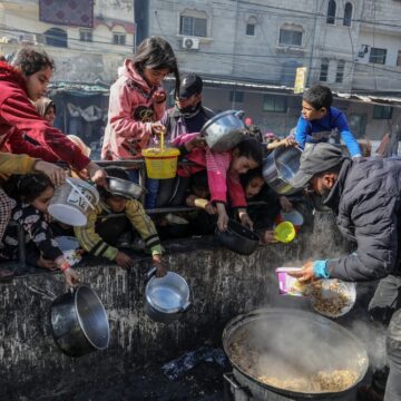 A Charity Organization Distributes Food To Displaced Palestinians Children