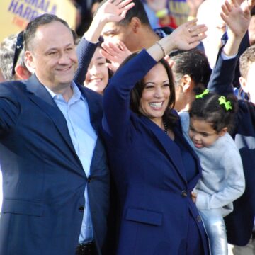 U.S. Vice-President And Democratic Presidential Nominee Kamala Harris Stands With Her Husband Douglas Emhoff