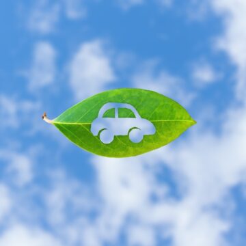 A,Green,Leaf,Featuring,A,Cutout,Of,A,Car,Symbolizes HYDROGEN-FUELED AIR TAXI GOES 500 MILES WITH FUEL LEFT OVER