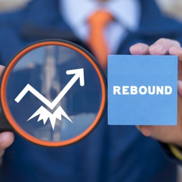 Concept Image Of Business Rebound With Man, Up Arrow Graph, Block With The Word Rebound