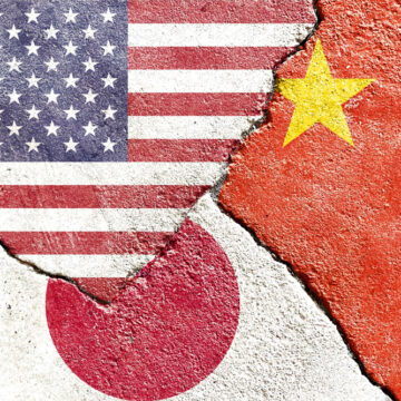 U.S., China, And Japan National Flags Painted On Concrete Wall