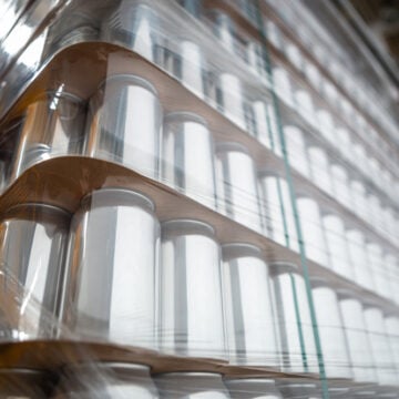 Stack Of New Aluminum Cans Stacked On A Pallet