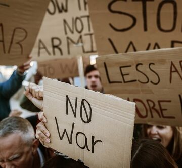 Group Of Diverse Demonstrators Marching For World Peace