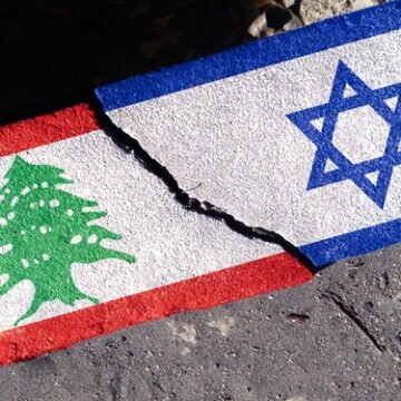 The Israeli And Lebanese Flags Painted On Cracked Concrete