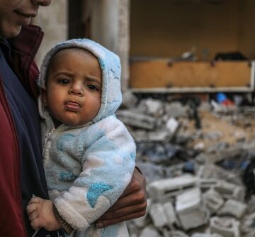 Palestinian Mother And Child After An Israeli Air Strike