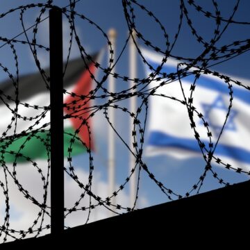 Flags Of Israel And Palestine Behind Barbed Wire
