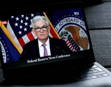 February,1,,2023:,Fed,Chair,Jerome,Powell,Talking,About,Inflation, Fed Chair Jerome Powell On A Laptop Talking About Inflation