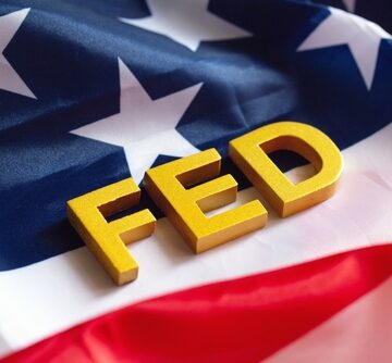 The Acronym FED Atop The American Flag