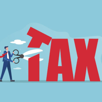Illustration Of Businessman Cutting The "T" in The Word TAX With Large Scissors