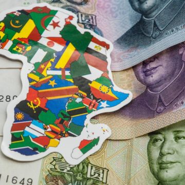 GLO ECON-CHINA HAS USED LOANS Concept Image Of Chinese Currency And A Map Of The Continent Of Africa