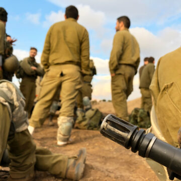 Israeli Soldiers Resting During IDF Military Training In The Golan Heights