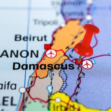 Damascus,Pin,Map.,Close,Up,Of,Damascus,Map,With,Red A Close-up Of A Map Of The Middle East With A Red Push Pin In Damascus