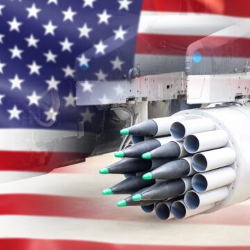 Concept Image Of Missiles And Weapon With The U.S. Flag In The Background