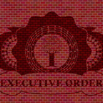 A Brick Wall With An Emblem And The Words "Executive Order"