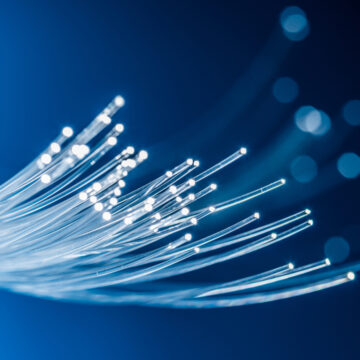 NEW OPTICAL FIBER CARRIES 10,000 TIMES MORE DATA