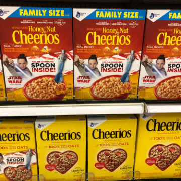 Honey Nut And Regular Cheerios On Shelves In Grocery Store