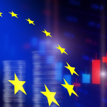 The EU Flag With Blurred Data And Graphs In The Background