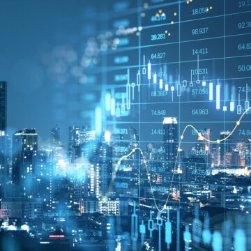 Glowing Data Graphs Superimposed Over A City Skyline At Night