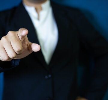 Businessman's Hand Gestures With Pointed Finger