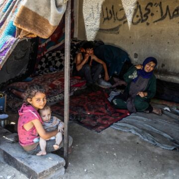 Displaced Palestinian Family Living In A Makeshift Tent