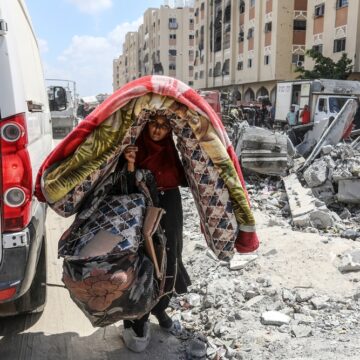 Palestinians Seen With Their Belongings After Fleeing From Hamad City