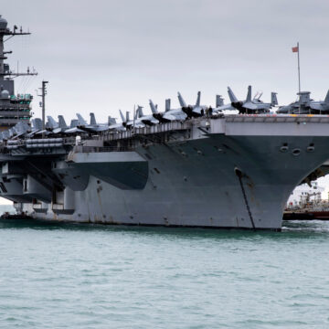 U.S. Aircraft Carrier USS Harry S Truman In Stokes Bay, Hampshire, UK