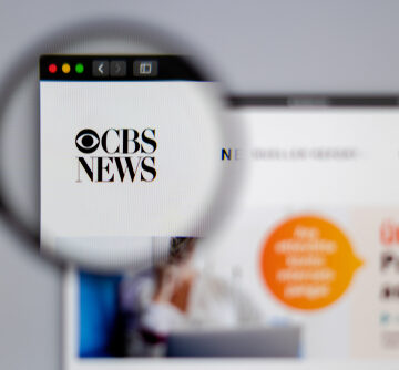 New,York,,Usa,-,March,26,,2019:,News,Media,Cbs The CBS Webpage With A Magnifying Glass Zooming In On The CBS Logo