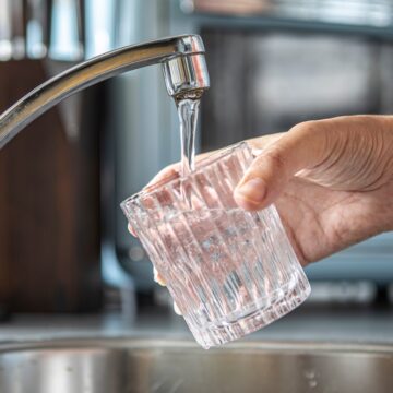 Closeup,Of,A,Glass,Being,Filled,With,Tap,Water,In Closeup Of A Glass Being Filled With Tap Water
