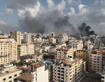 Aerial View Of Gaza City Neighborhood Rimal With Large Smoke Clouds From Bombing