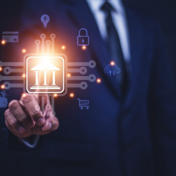 Concept Image Of Businessman Hand Touching Bank Icon On Virtual Display