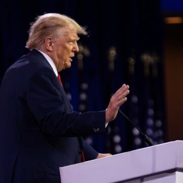 Donald Trump Speaking At A Podium