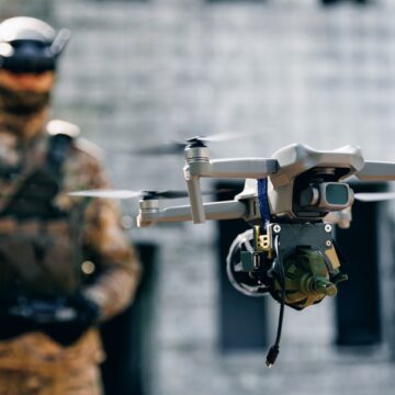 Soldier Operates UAV Drone That Carries Bomb