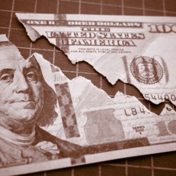 U.S. $100 Bill Torn Down The Middle