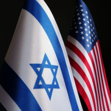 The Flags Of Israel And The U.S. Side By Side