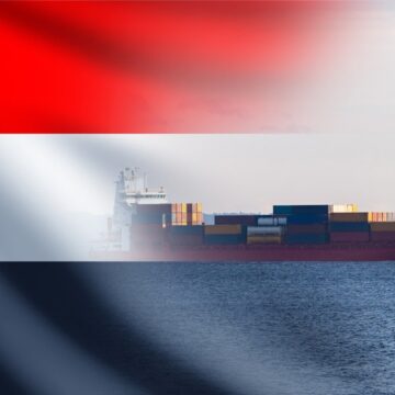Concept Image Of A Container Ship Overlaid With The Flag Of Yemen