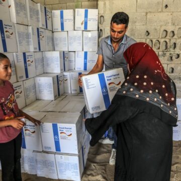 The World Food Program Distributing Aid To Needy People