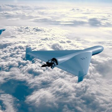 Group Of Kamikaze Combat Drones Flying Above The Clouds