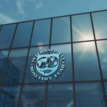 IMF RAISES GLOBAL GROWTH OUTLOOK ON WEAK DOLLAR