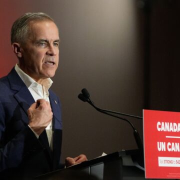 The Photo Shows Mark Carney, The Canadian Prime Minister, Speaking At An Event