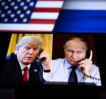 Image Shows A Split Screen With President Trump and Russian President Putin On The Phone, With The Flags Of The U.S. And Russia In The Background