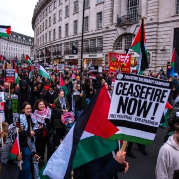 Palestinians Hold Placards During A London Protest In Solidarity With Gaza And Palestinian Prisoners In Israeli Jails