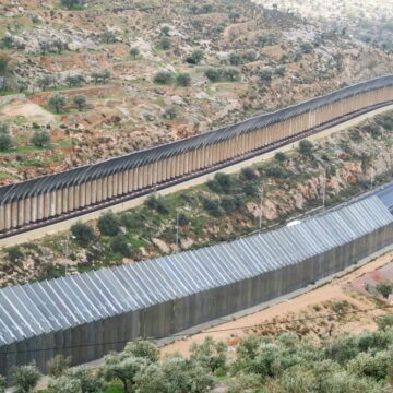 Aerial View Of A Section Of The Israeli West Bank Barrier, Referred To As "Apartheid Road" Because It Separates Palestinian Drivers From Israeli Settlers With A High Fence