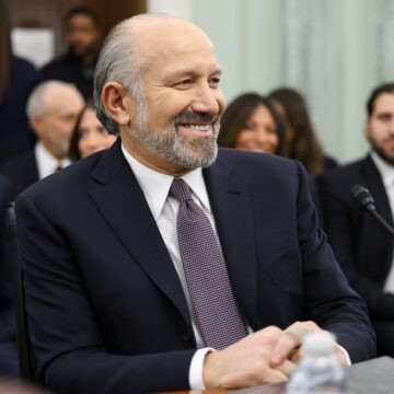 A Smiling Howard Lutnick At A Senate Hearing In Washington, DC